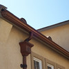abraingutters > Mitered endcaps on 5" k style copper gutters, # 9 leaderhead with Rose ornament.
http://www.abraingutters.com/cwleaderheads.html